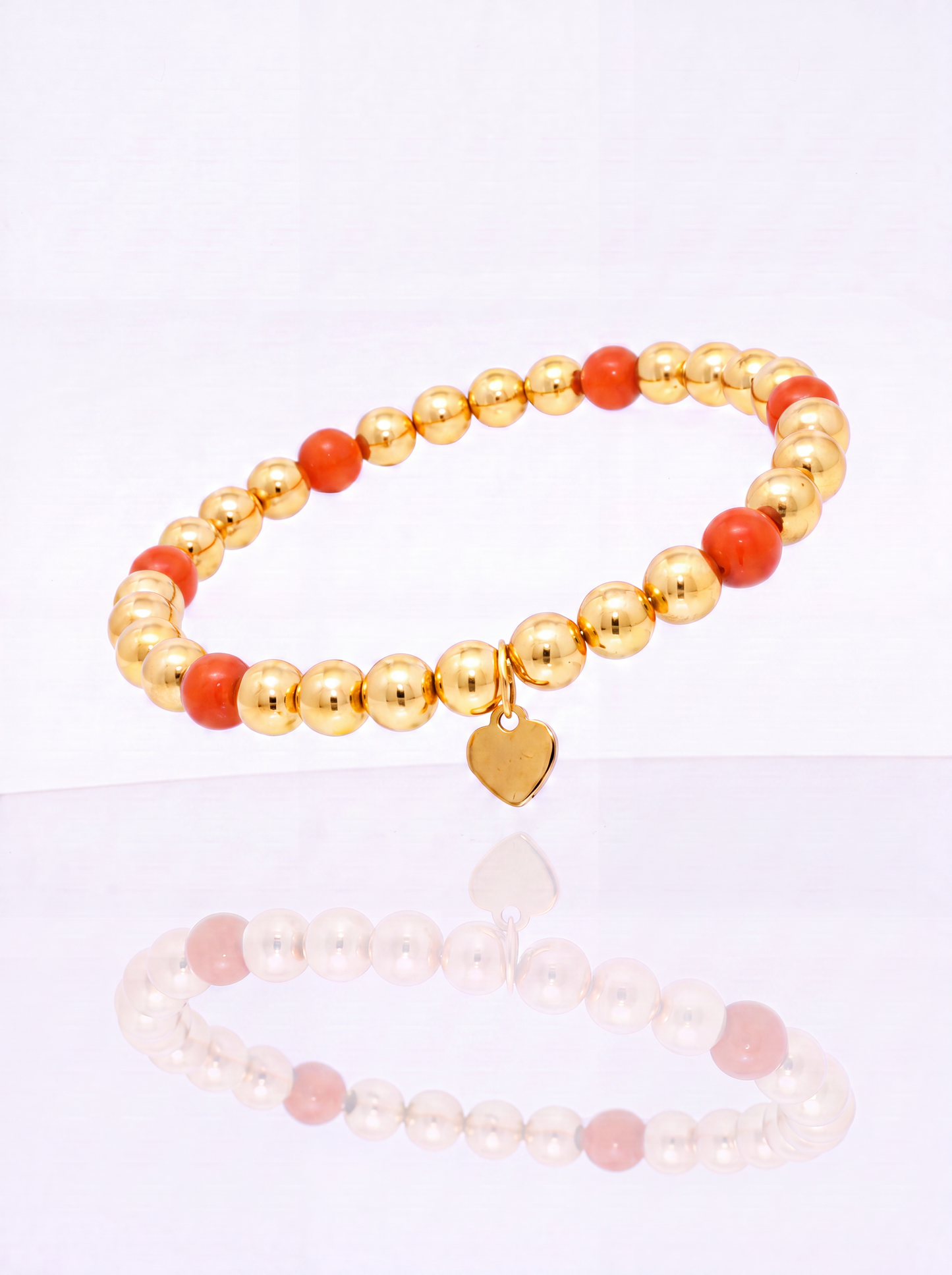 Solid 14k gold bead bracelet with coral station