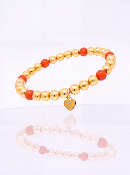 Solid 14k gold bead bracelet with coral station