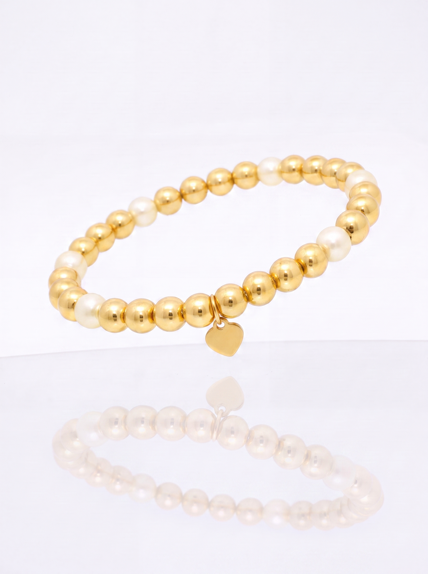 Solid 14k gold bead bracelet with mother of pearl station