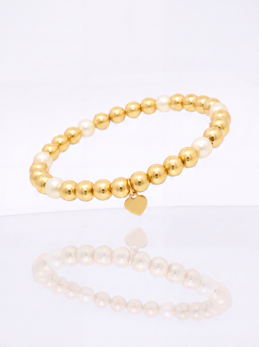 Solid 14k gold bead bracelet with mother of pearl station