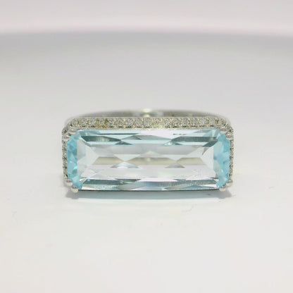 0.14CT Diamond and 4.40CT Light Blue Topaz Ring 14K White Gold